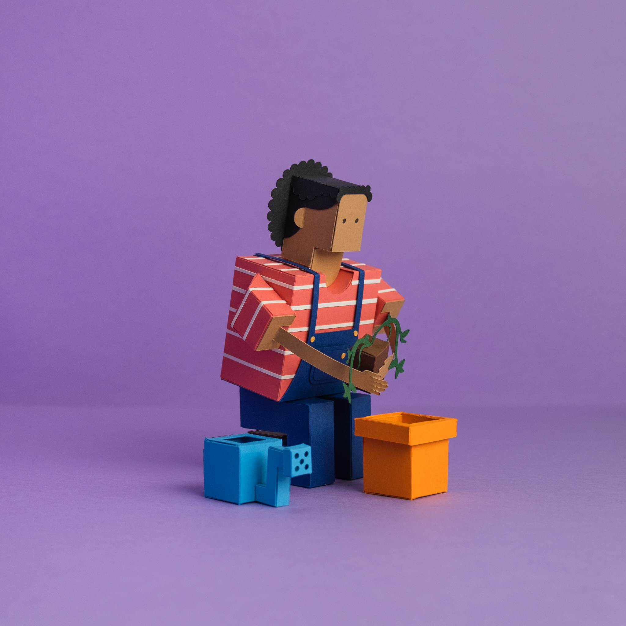 Paper Toy of a person holding a plant. Papercraft. Papercraft porto. Portugal arts and crafts. Original illustration Tridimentional. Character Design. Design de personagens.